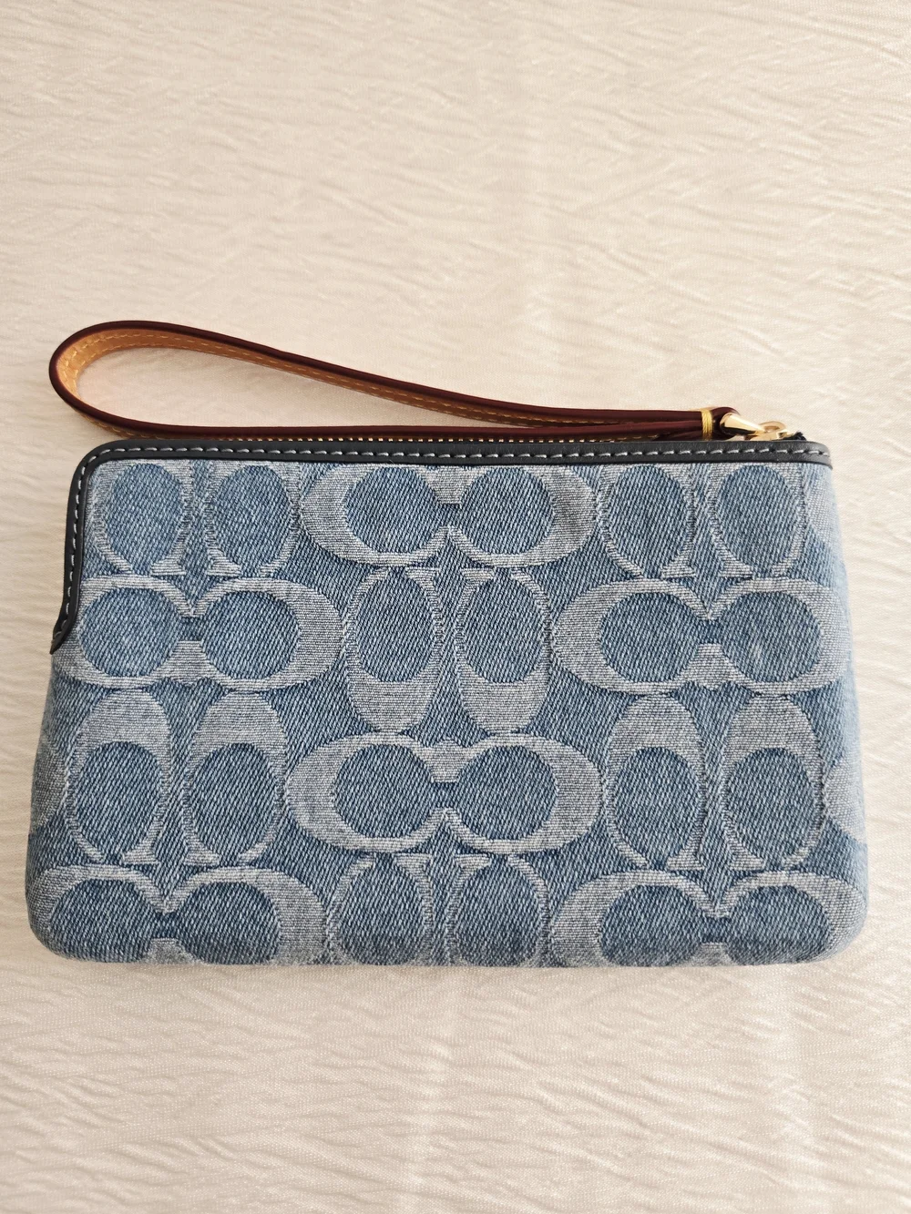 Coach Denim Signature Large  Wristlet in Blue with Tan Strap